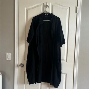 Lightweight Italian linen jacket-hits mid leg (I’m 5’8). Has pockets